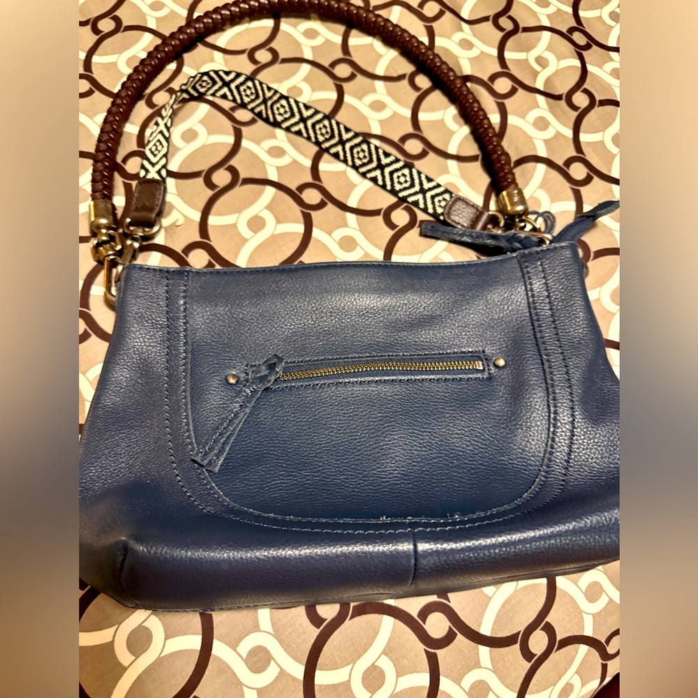 The Sak navy blue leather handbag